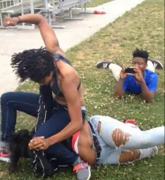 2 Niggers fighting and one of them taking photo