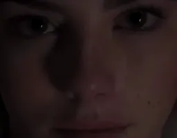 the girl is staring at camera