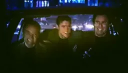 3 man are in the car and dancing