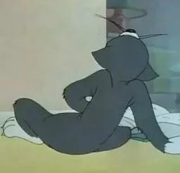 تام