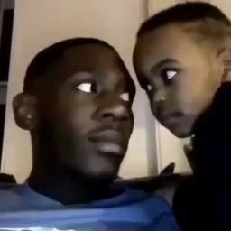 father and child look at each other