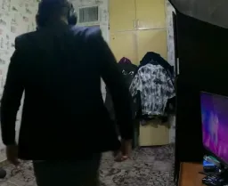 Man stand up and dancing with coat