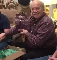 Old man having two same shirts