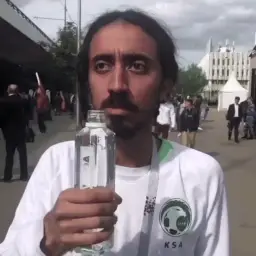 Man Nervously Drinking Water