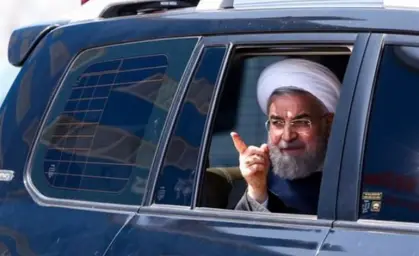 Hassan Rohani pointing his finger