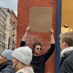 Man holding a sign