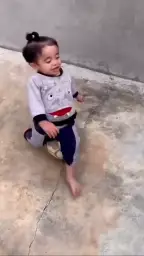 Kid tripping on ball