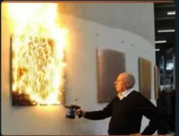 Man setting fire to sign