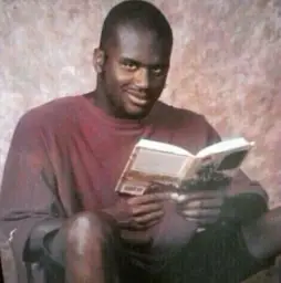 Black man reading a book