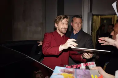 Ryan Gosling signing poster