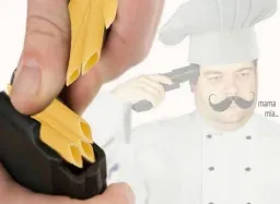 Italian chef pointing gun towards his head