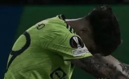 Sad garnacho sitting on the ground