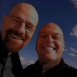 Walter White and the man laughing together