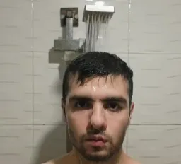 Sadness of man under the shower