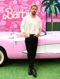 Ryan Gosling with a Barbie car