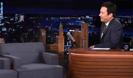 Jimmy Fallon and guest on sofa