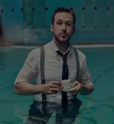 Ryan Gosling drinking tea in the pool