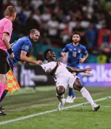 Referee grabbing player collar