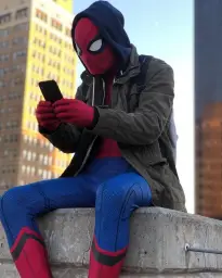 spiderman looking at phone