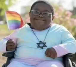 jewish man with Lgbtq flag honest re action