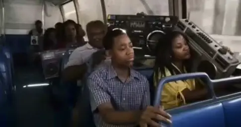 Dancing and shaking head in school bus