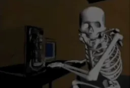 Openeng the mouth of the surprise skeleton sitting behind the computer