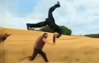 Boys floating in wheat field