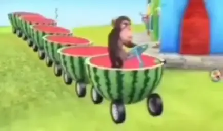 Monkey driving with a watermelon car