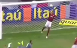 Preventing the ball from being scored by the defender with his hands