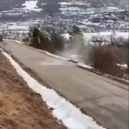 Rally car rolling off cliff