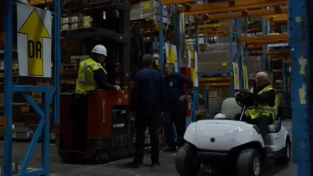 Mike working in warehouse