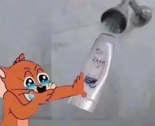 Jerry filling his shampoo bottle with water