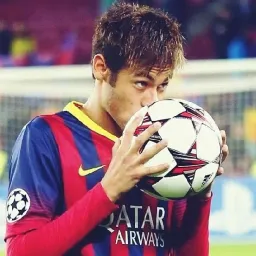 Neymar kissing the ball