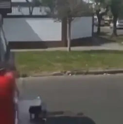 Spiderman following firetruck on scooter