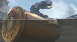 مار رنگو در حال نگاه به تیر