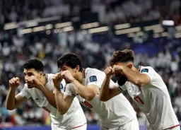 Iranian football players crying 