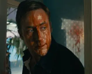 Ryan Gosling with a blood face