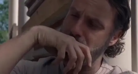 Rick Grimes looking at letter