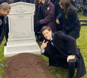 Grant Gustin Next to Oliver Queens Grave