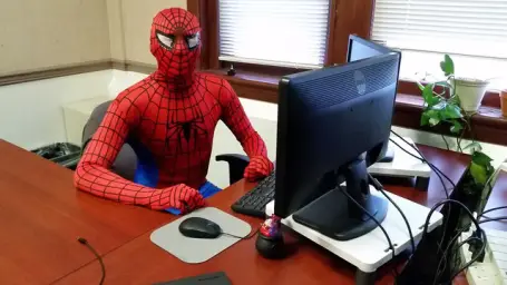 Friendly neigborhood spiderman at desk