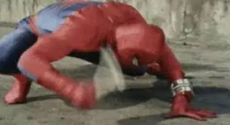 Spiderman hitting button