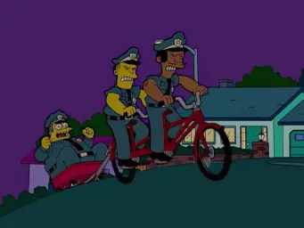 Pulling Chief Wiggum Uphill on a Bicycle