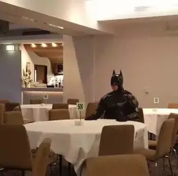 Batman sitting alone