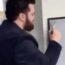 Guy Explaining with White Board