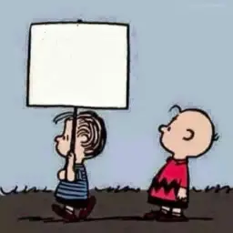 Charlie Brown and Linus With Sign