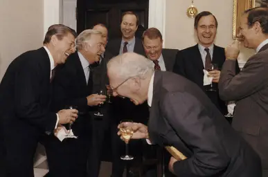 Rich old men laughing