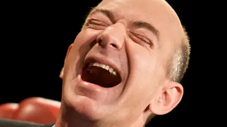 Jeff Bezos laughing hysterically