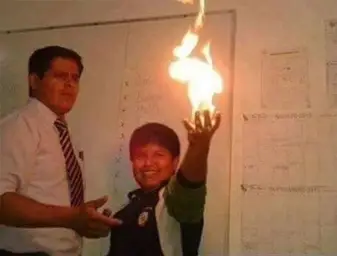 Kid Holding Fire